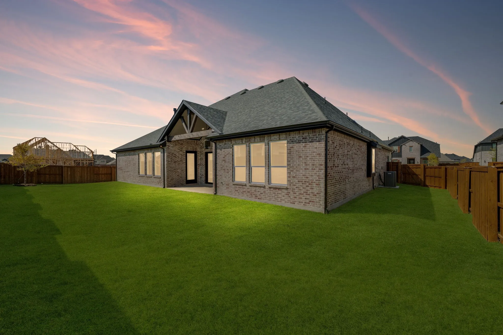 The entire family will enjoy plenty of outdoor summer time fun in this lovely fenced back yard with covered patio.