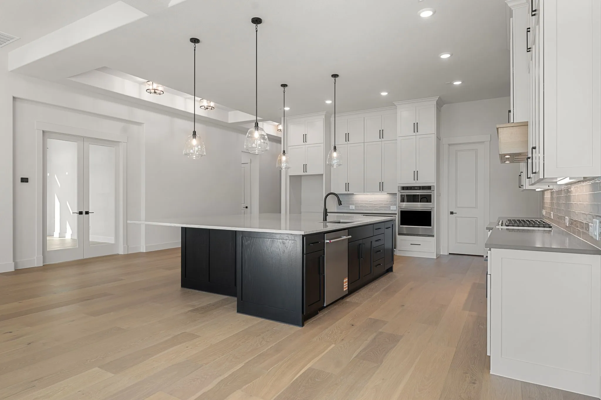 Featuring a classic black and white color palette, this dream kitchen will never be out of style!