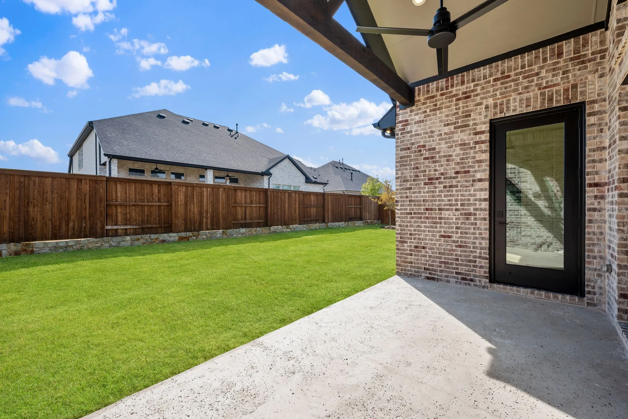 It's easy to take the party outside on this covered back patio!