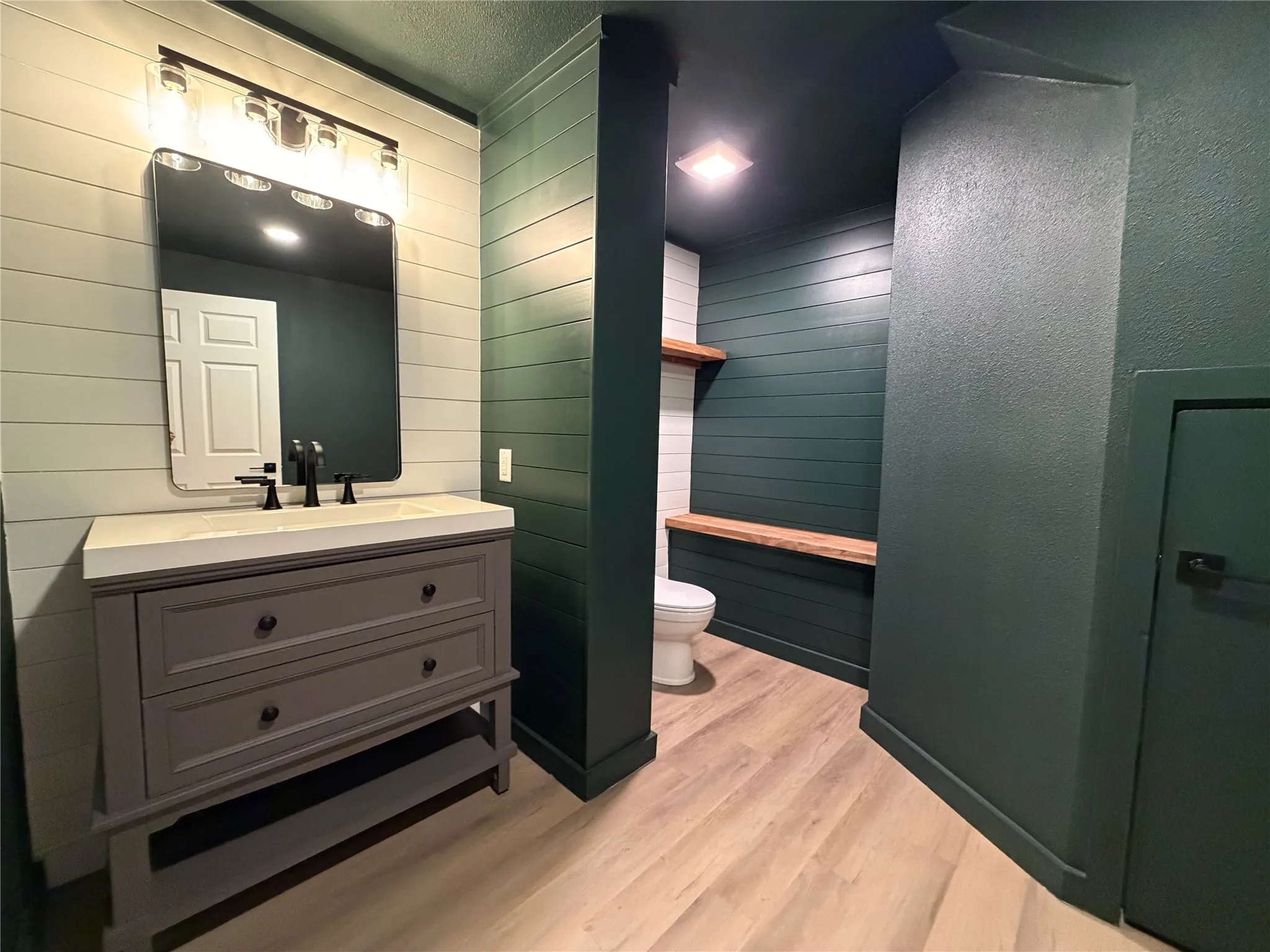 Updated color drenched bathroom