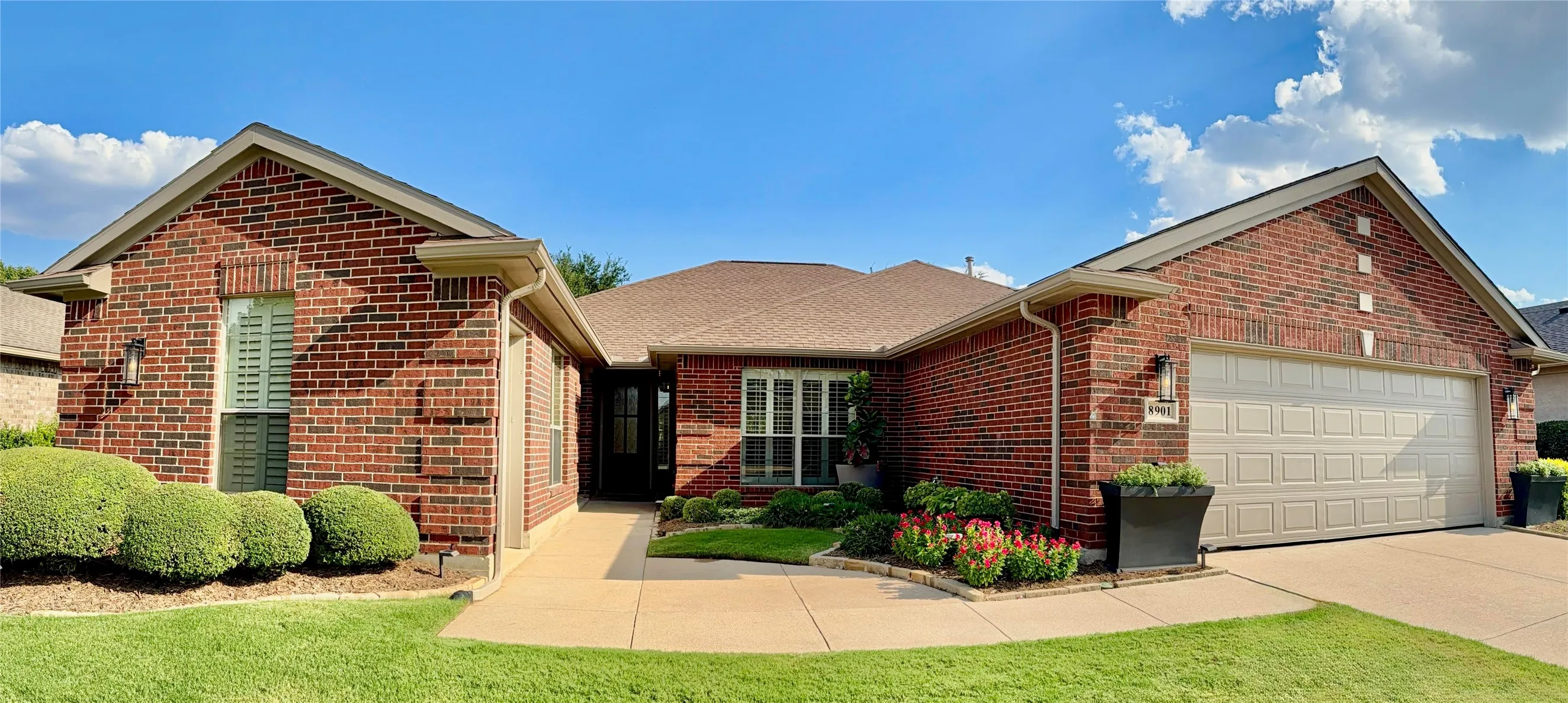 Landscaped Courtyard Welcomes You In!