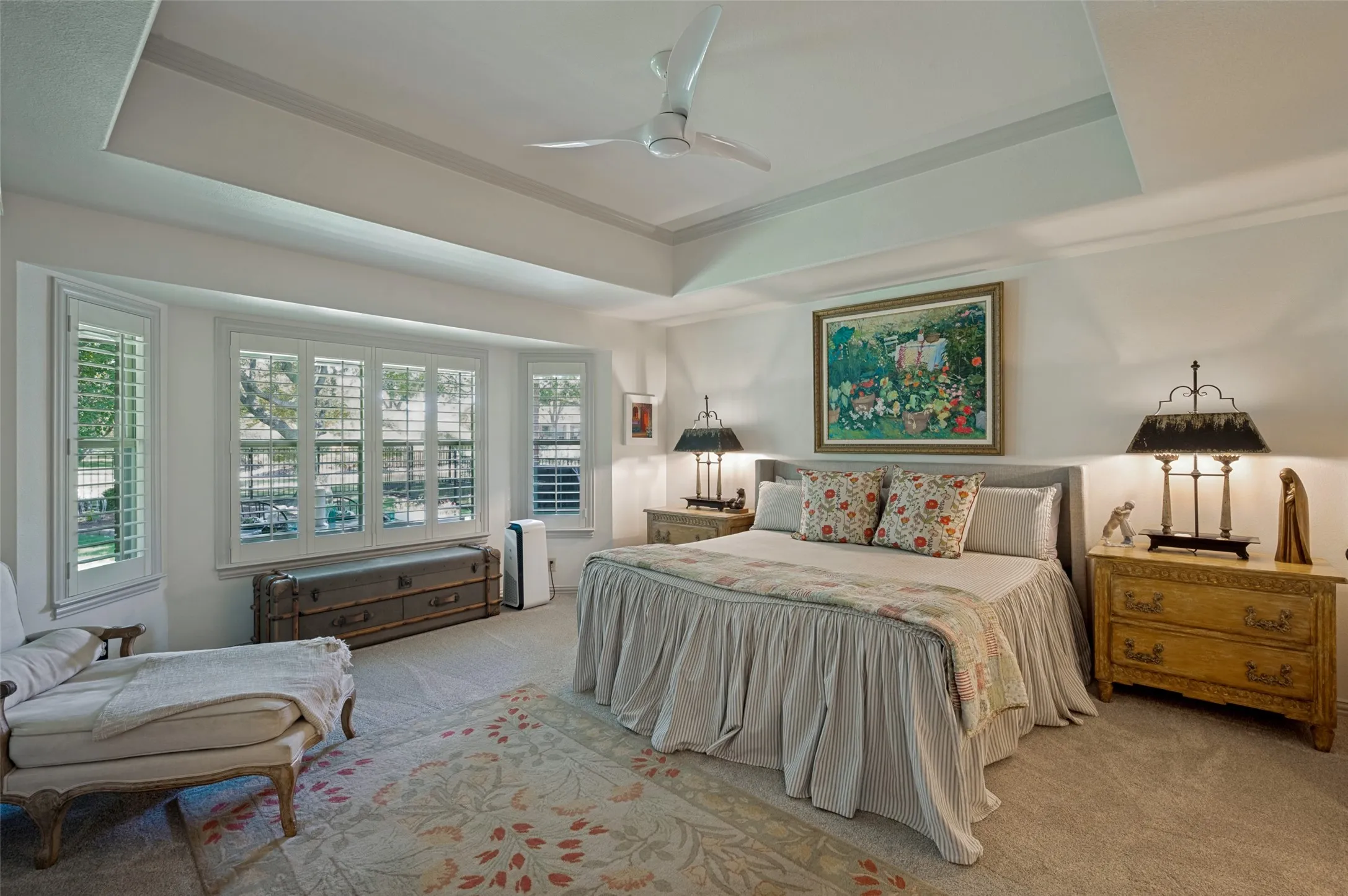 A Bay Window and Coffered Ceiling in the Primary Bedroom