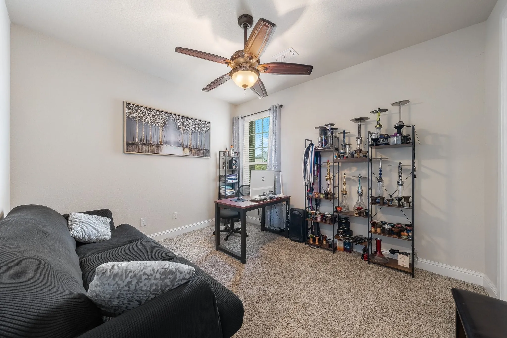 Secondary bedroom downstairs offers privacy and flexibility