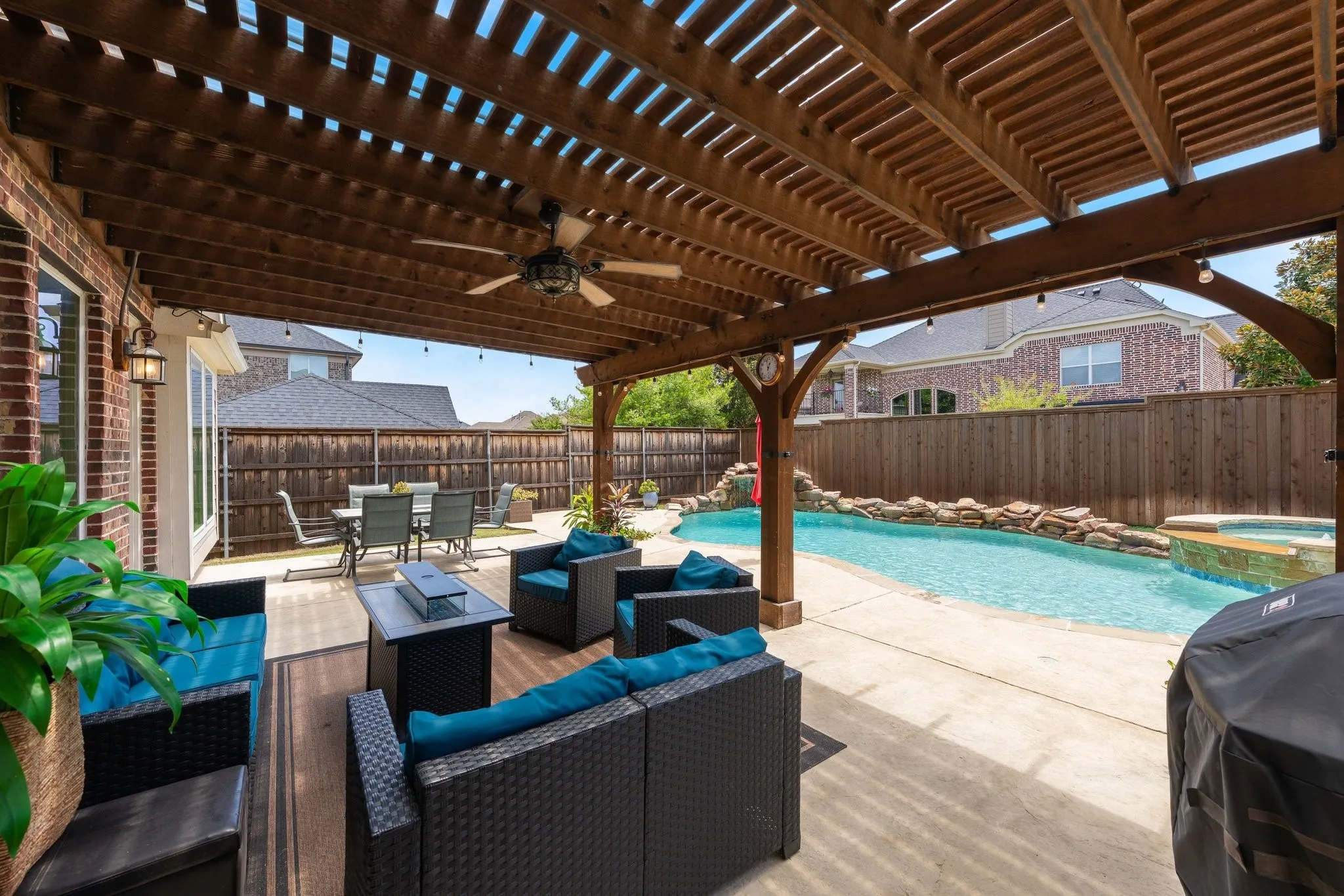 Large out door are with covered patio and the space for outdoor dining