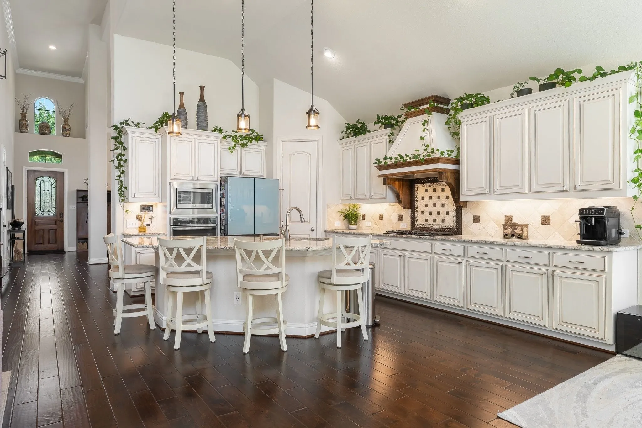 Huge island, abundant cabinetry and an open connection to the family room and dining area