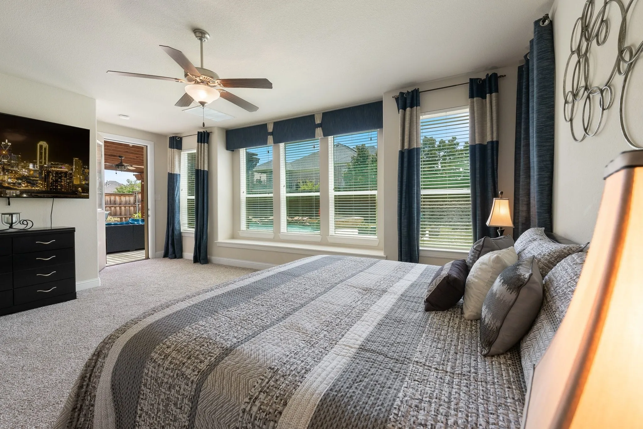 Primary bedroom offers a sense of calm and solitude. It has easy access to the outdoor area