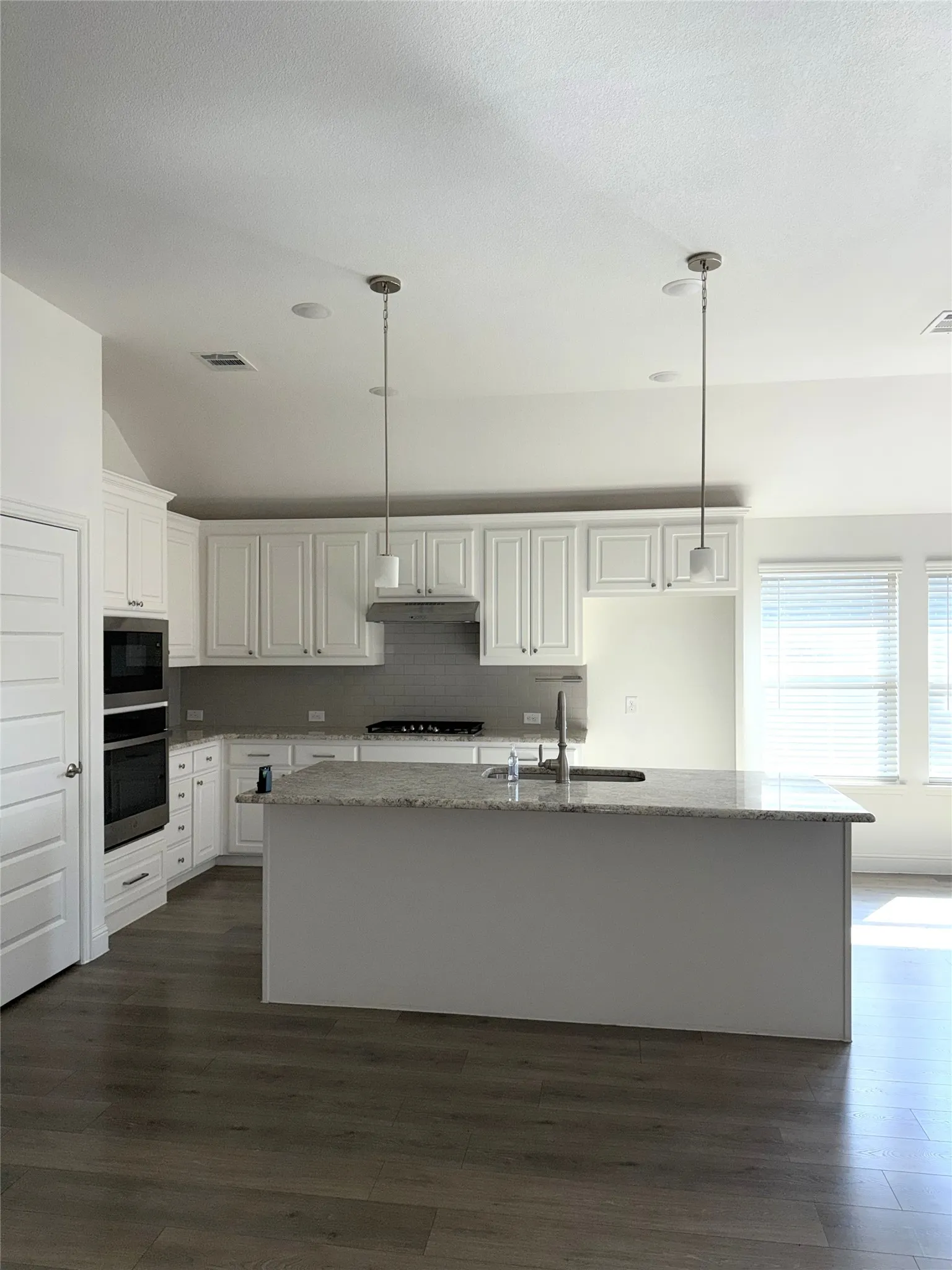 view of kitchen from family room
