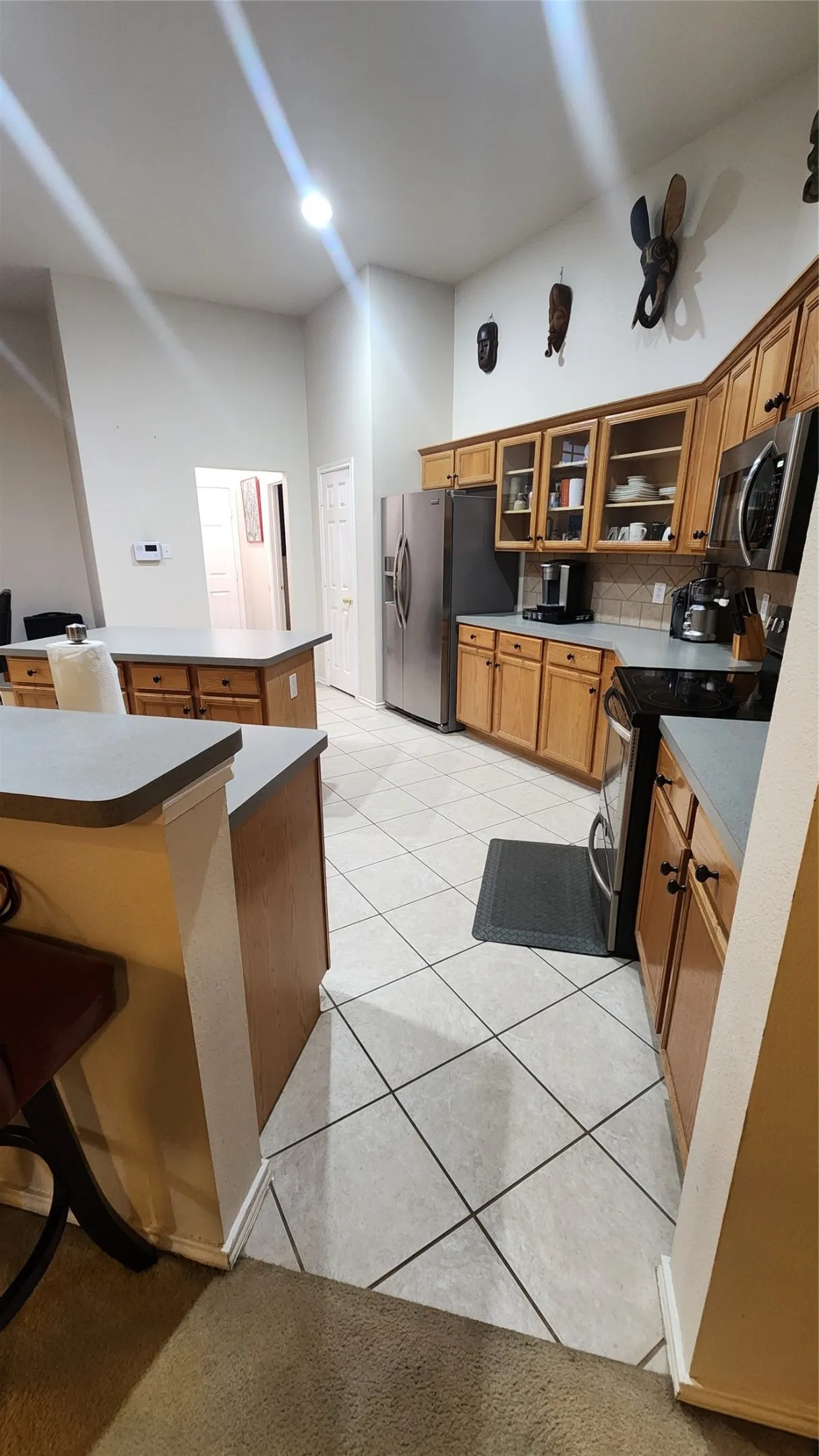 Doorway leads to garage and laundry room