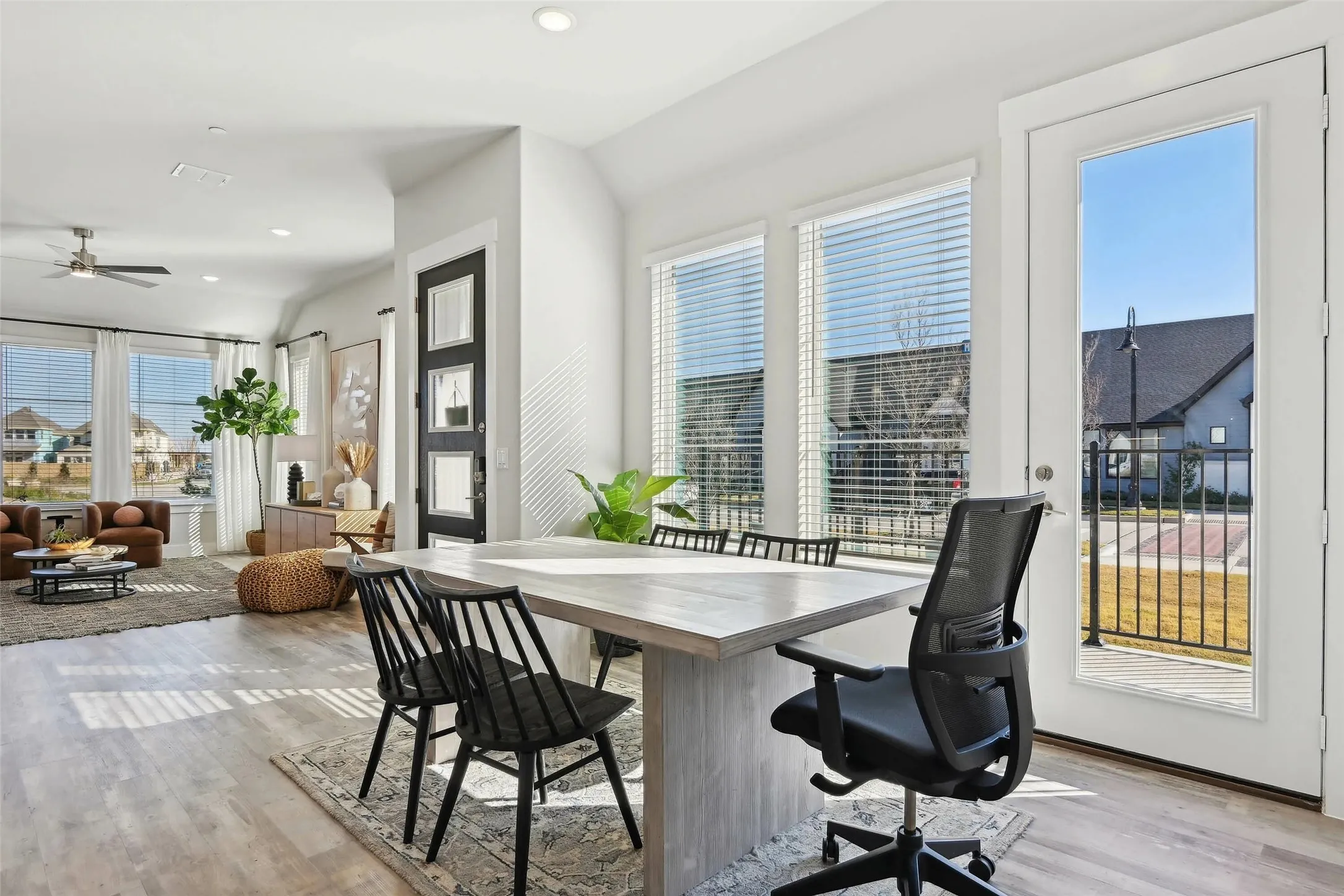 Spacious interior with wood-finish flooring, recessed lighting, and a ceiling fan