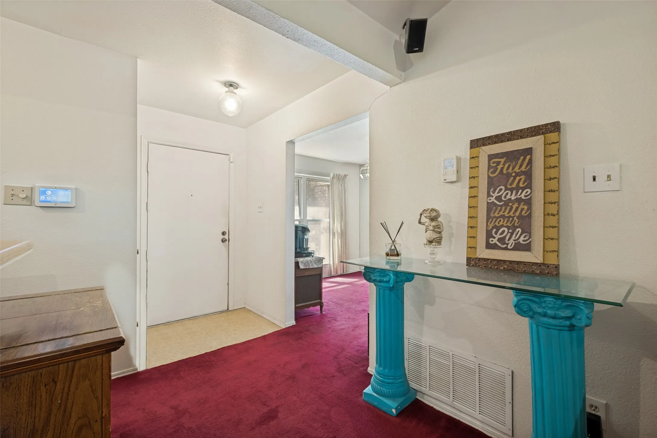 Welcoming Entryway with Wet Bar on the right
