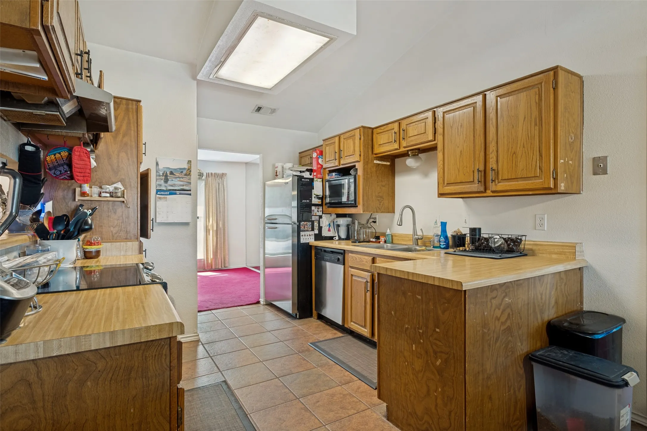 View from Kitchen Dining into Formal Dining at other end