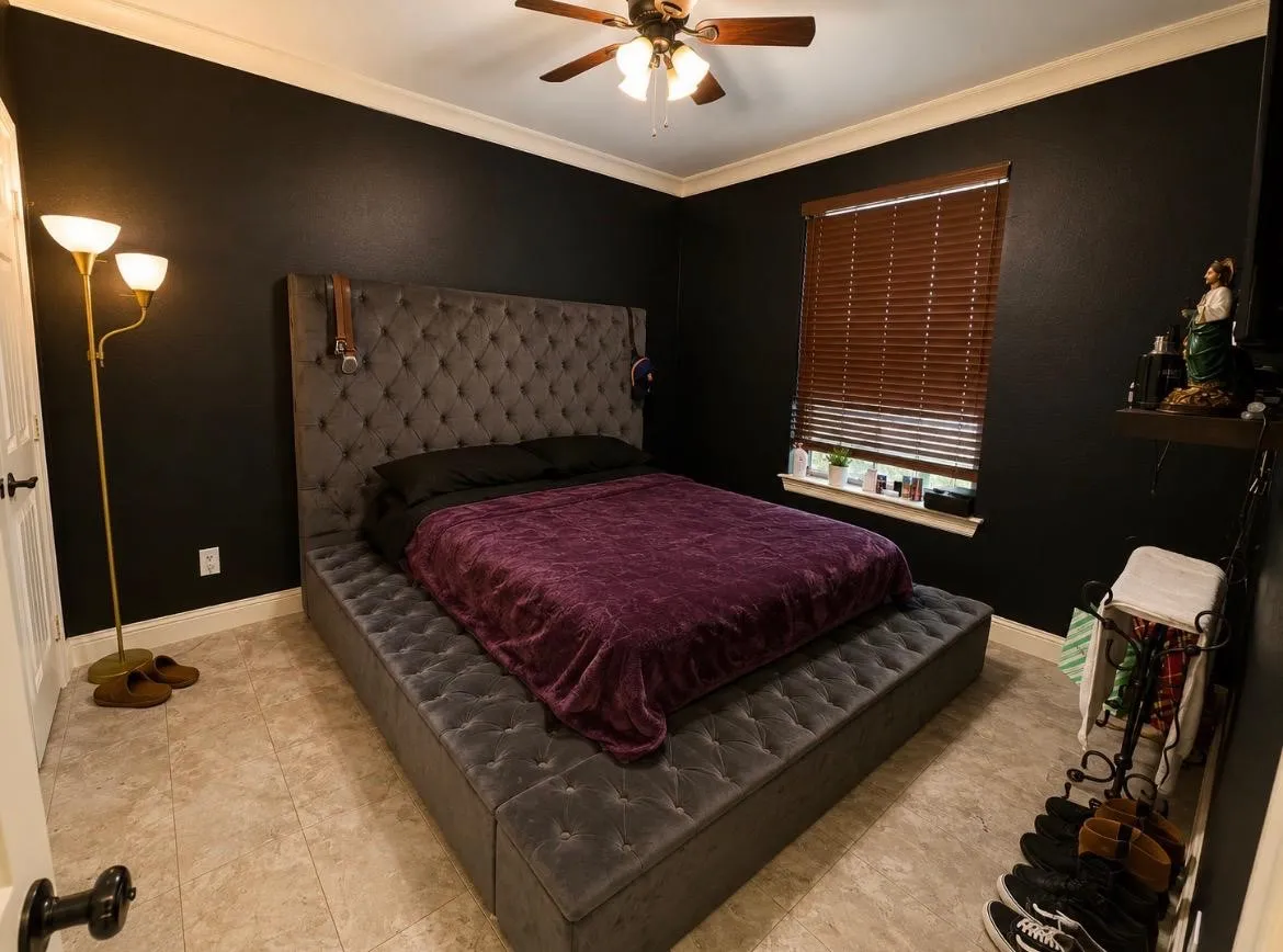 Tiled flooring, crown molding, ceiling fan, window with wood blinds, and a built-in wall shelf