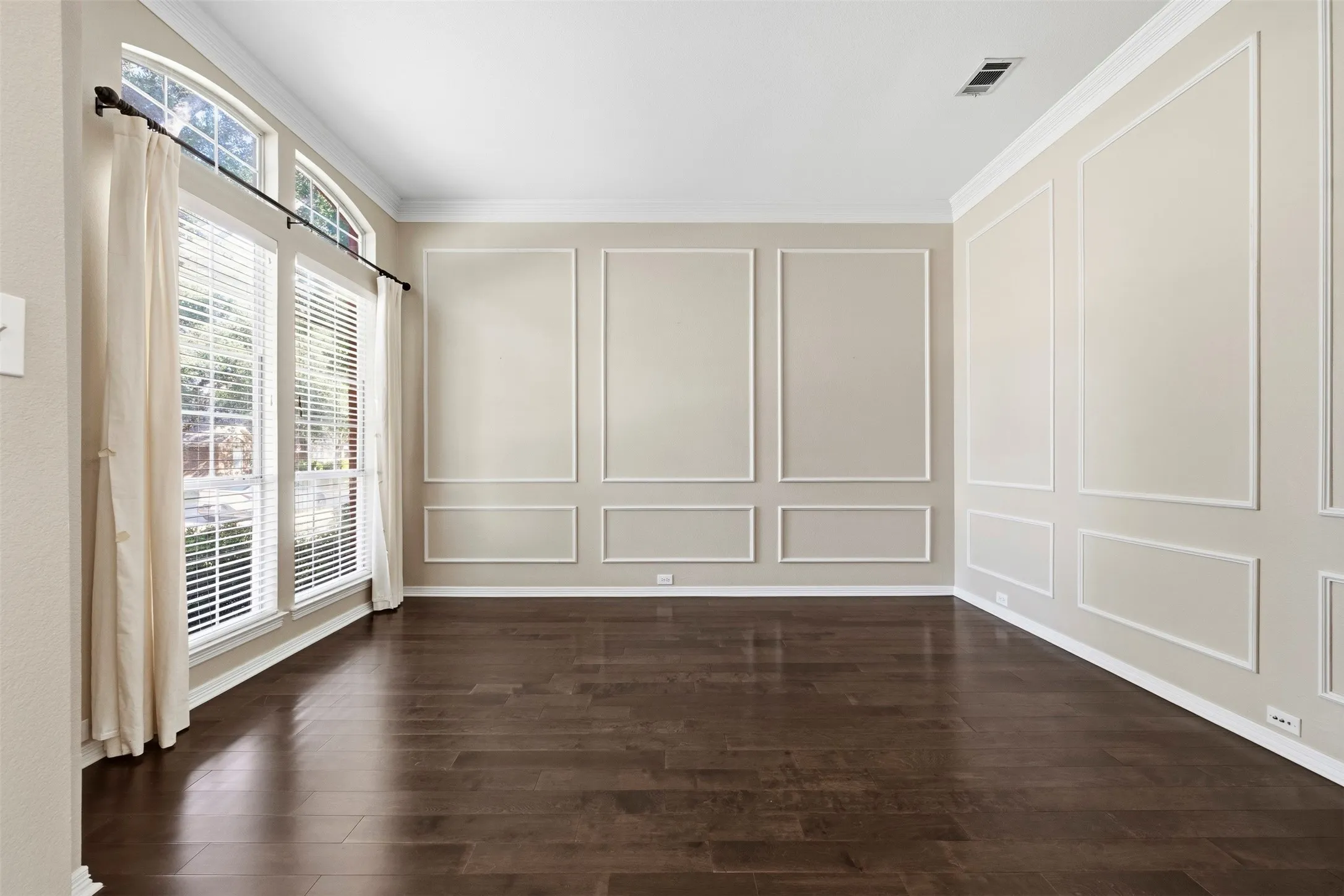 Formal living room at front of home can be used as a home office