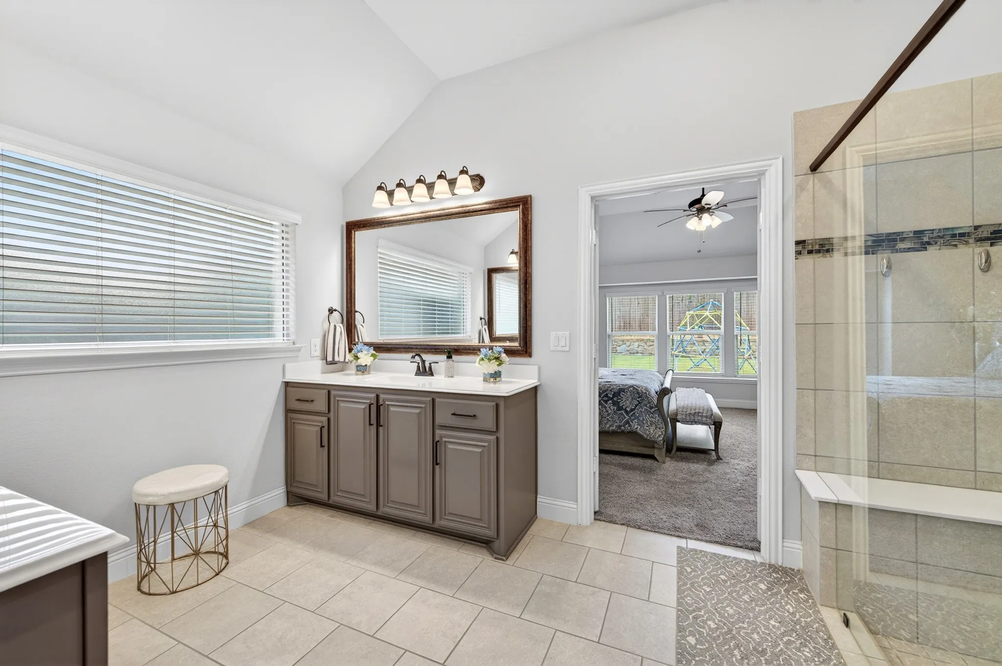 Huge walk in shower in primary bath plus oversized linen closet, door on water closet area, and generous walk through closet to Laundry Room