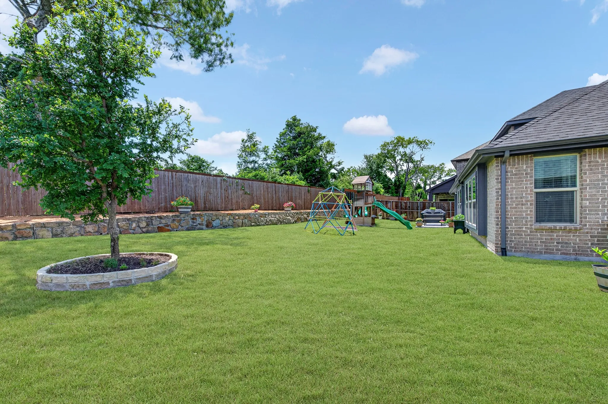 Large wrap around yard grassy.