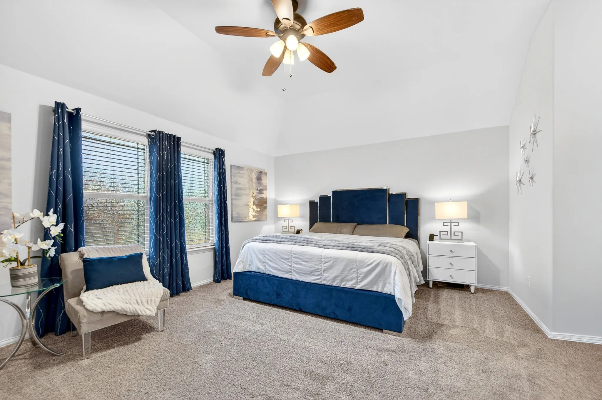 Second  Primary Bedroom is upstairs and is large enough for King Sized Bed, oversized nightstands, and sitting area.