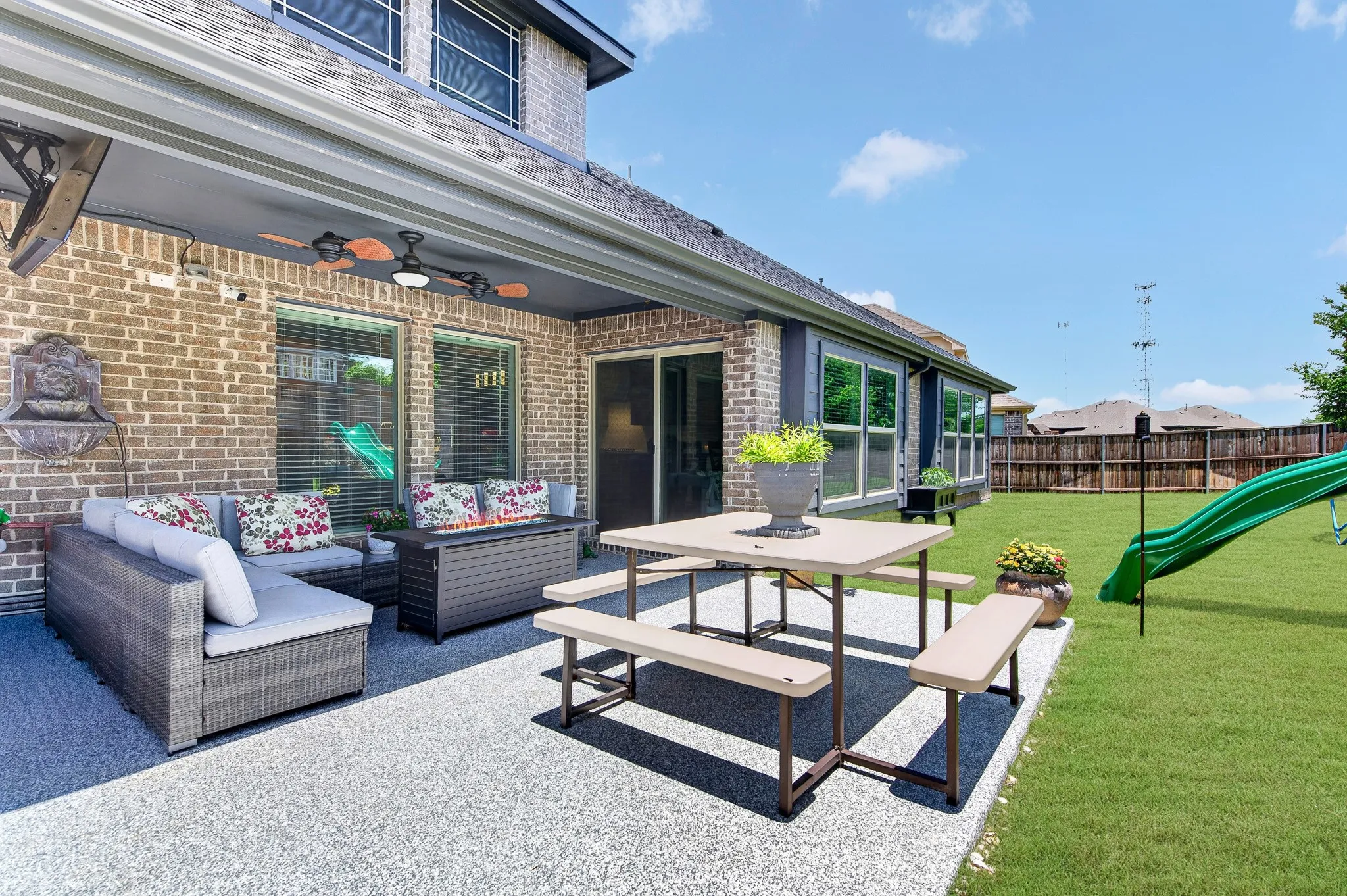 Extended patio outdoor living area.
