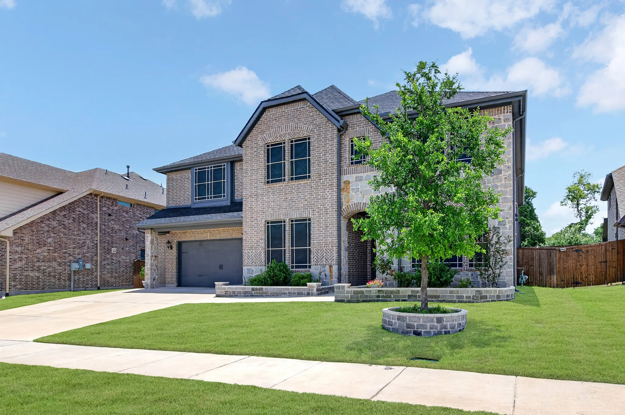 Beautiful brick and stone elevation with upgraded and extra stone