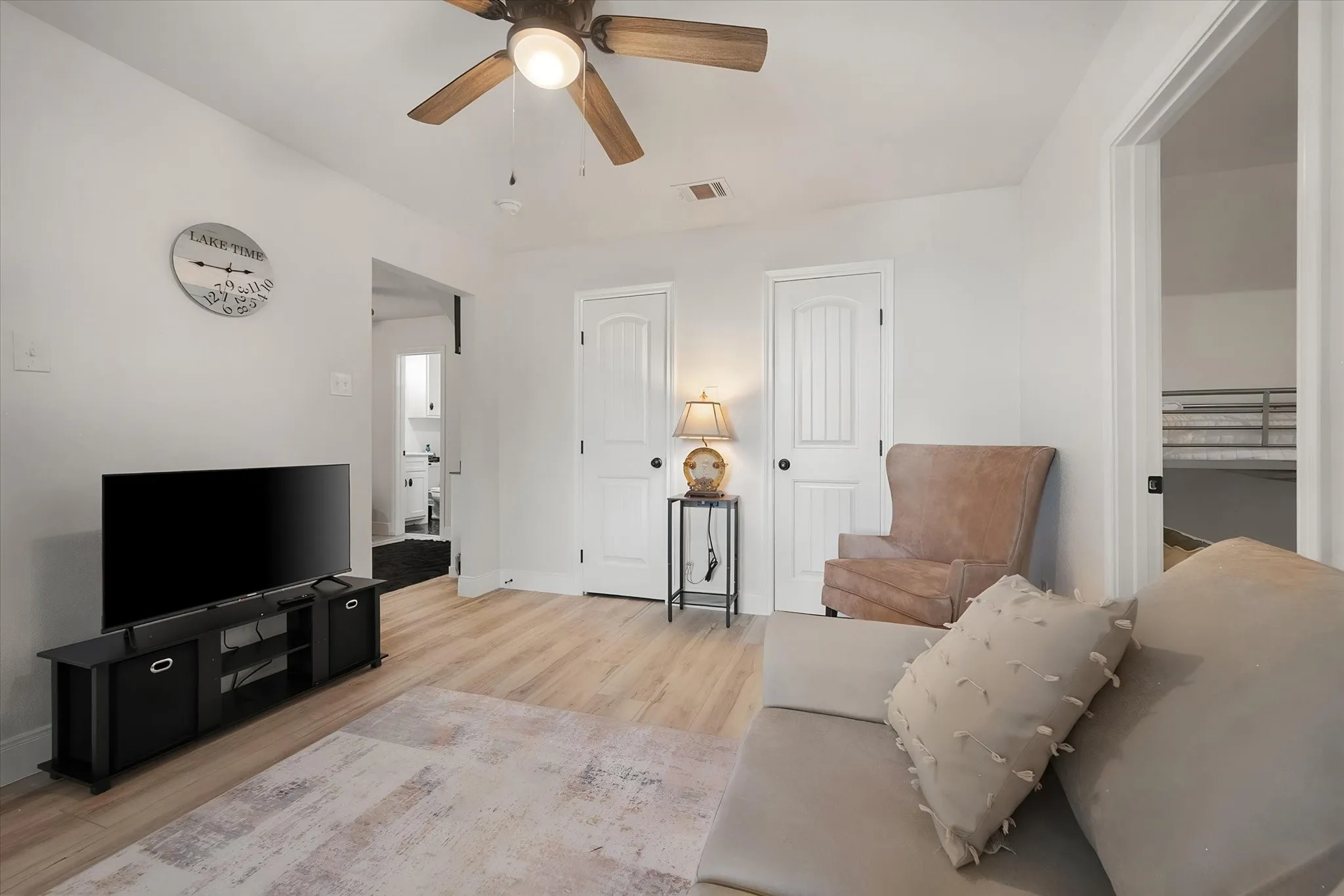 Flexible upstairs media and recreation area offers additional space for movies, games, lounging, or entertaining overnight guests.