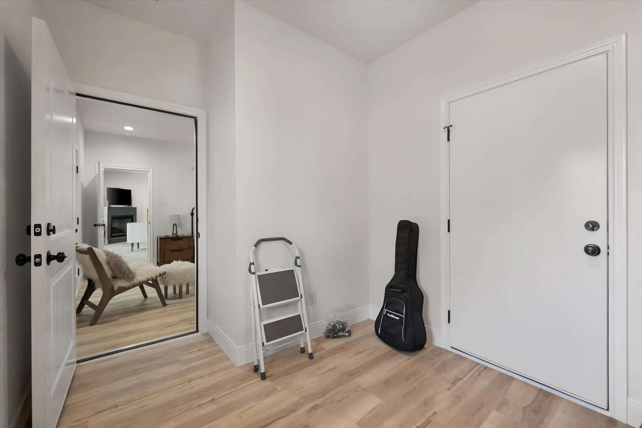 Versatile interior space near an exterior entrance offers additional room for storage, hobbies, recreation equipment, or everyday organization.