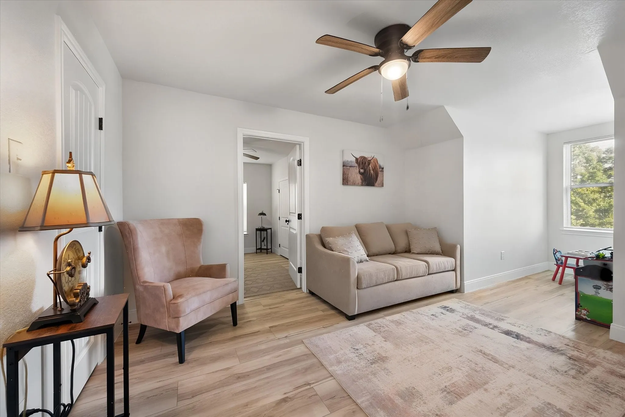 Additional upstairs flex space provides room for a sitting area, playroom, home office, or other personalized use.
