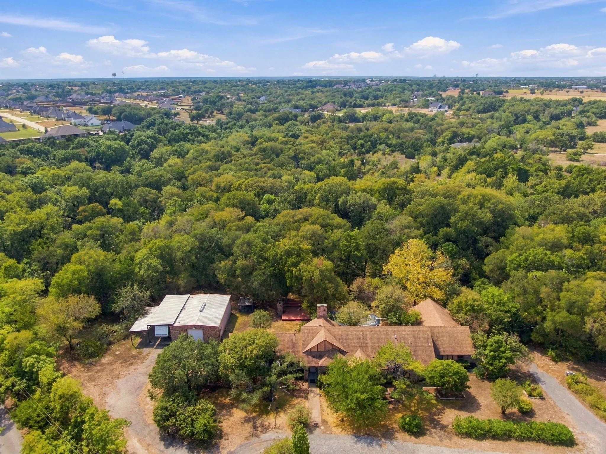 10 wooded acres to do what you want outside City Limits!
