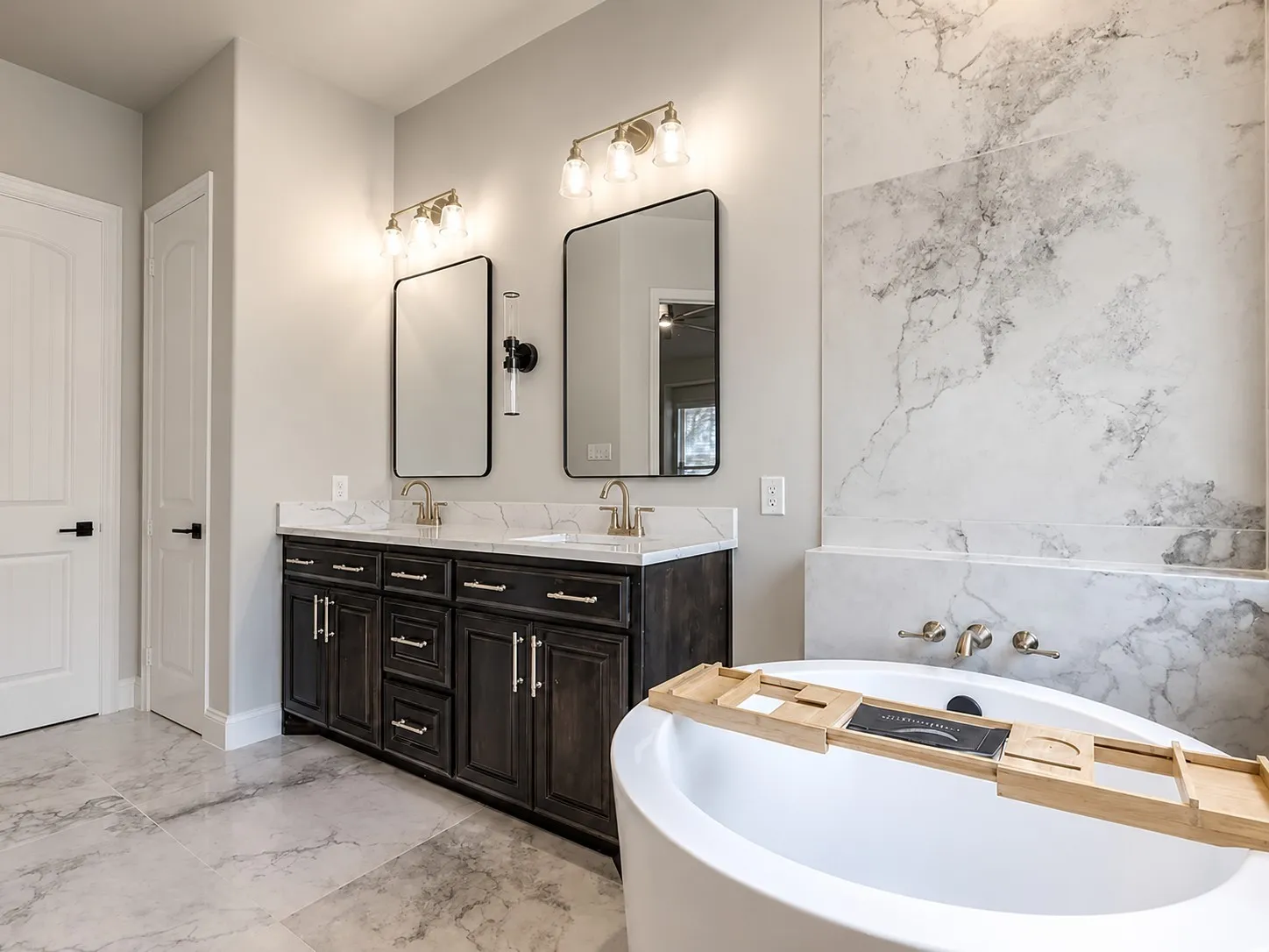 Dual vanity with dark wood-finish cabinetry, white countertops, and undermount sinks