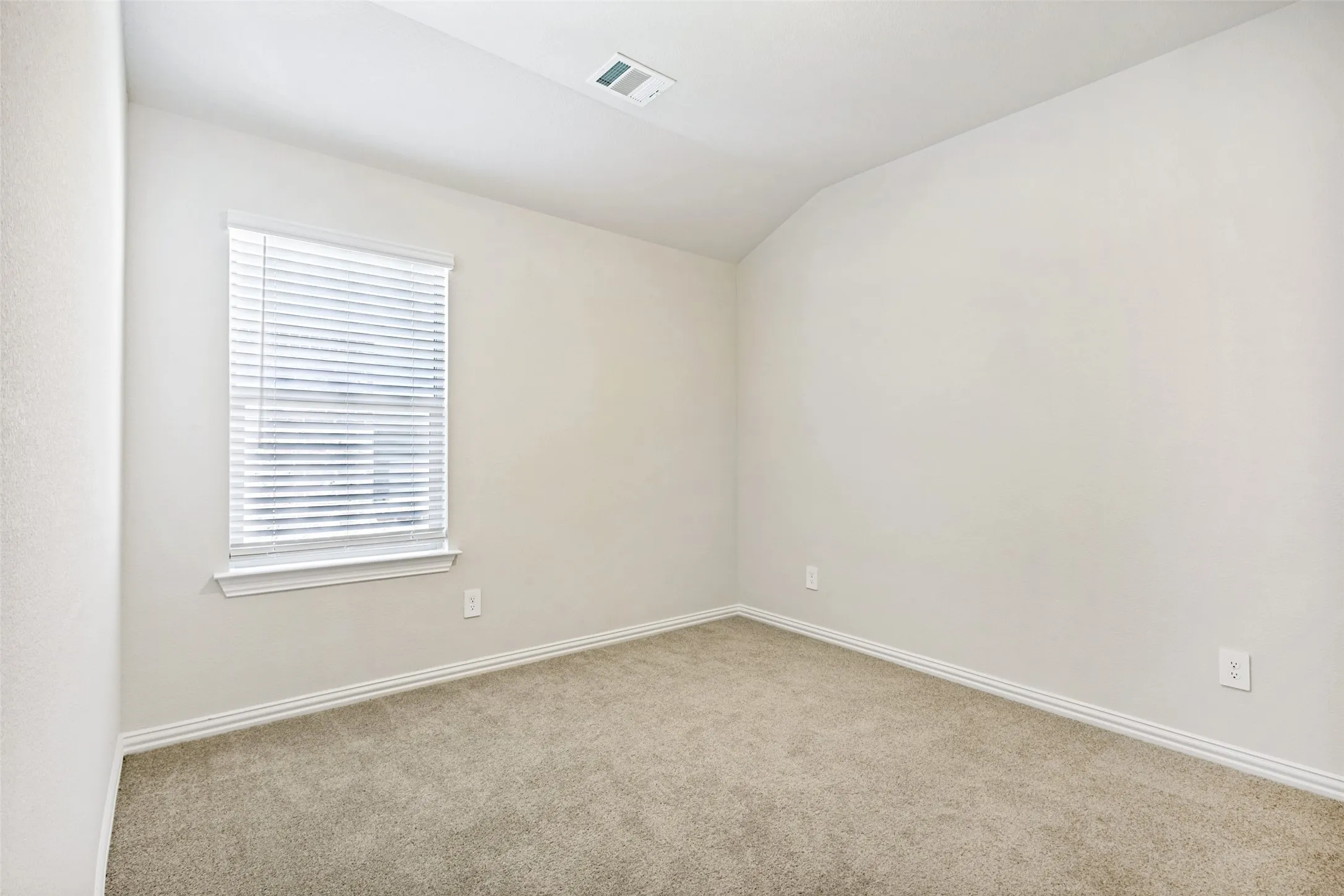 Neutral tone walls with white trim