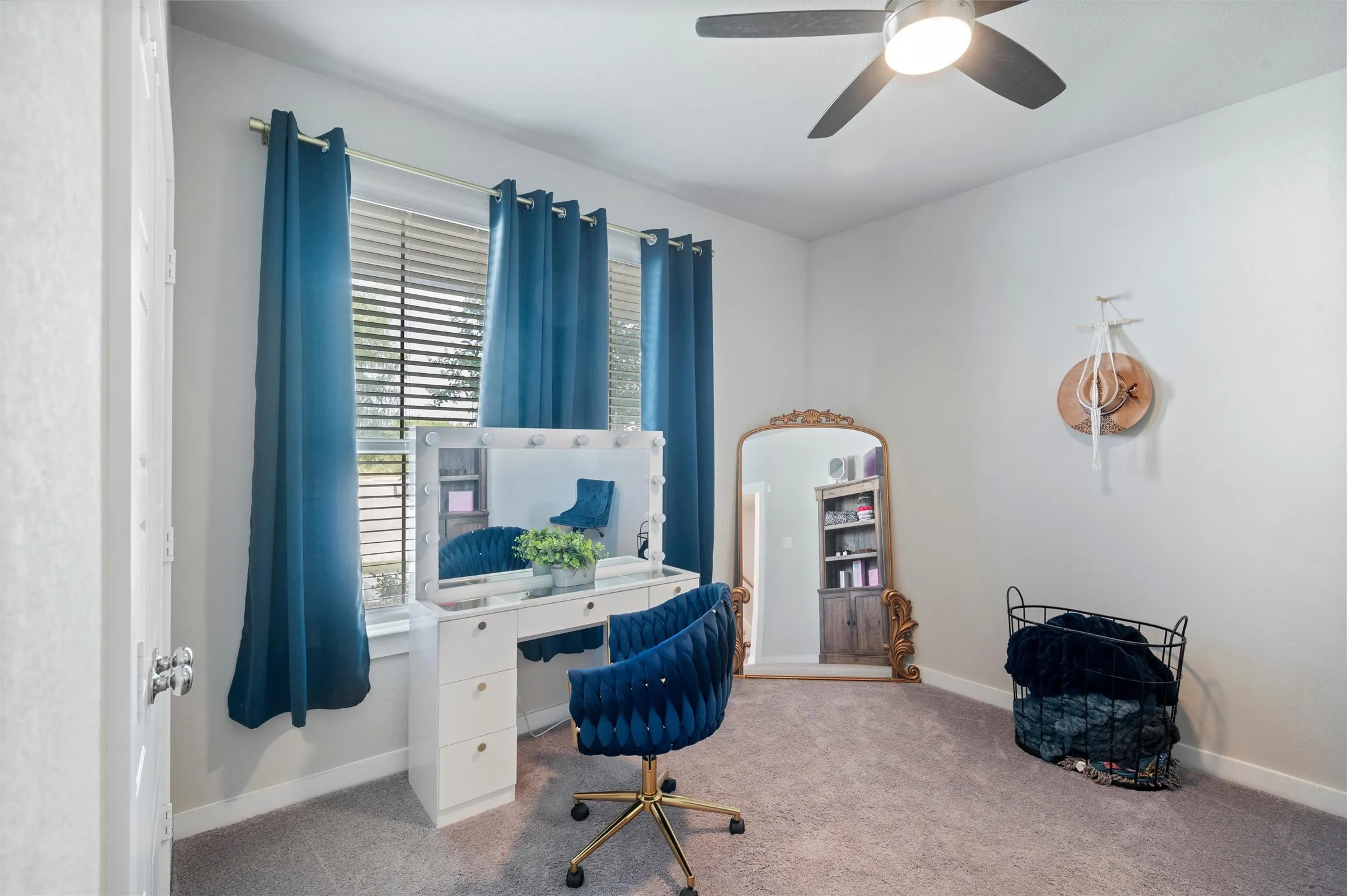Recessed window with blinds, ceiling fan with integrated lighting, and neutral wall paint