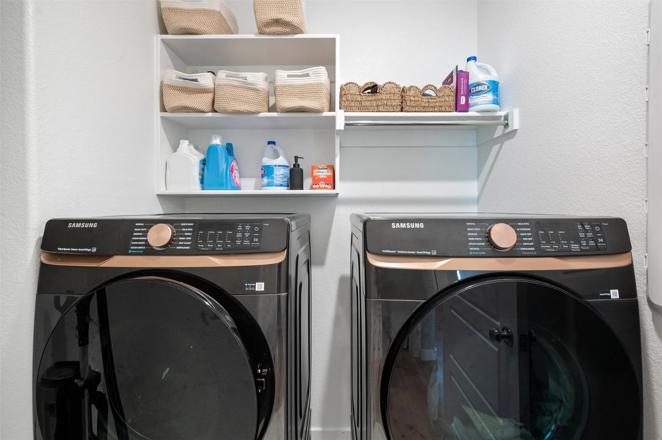 White wall-mounted shelving provides storage
