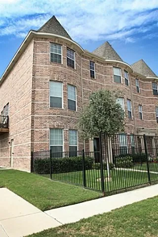 Brick exterior with lots of windows
