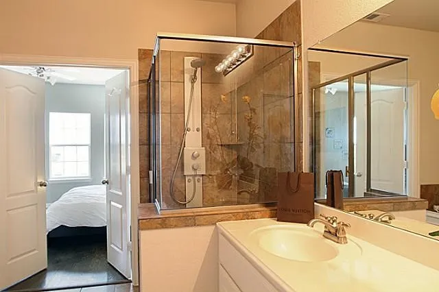 Primary Bedroom bath with separate bathtub and shwoer