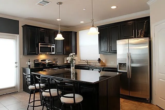 Spacious storage cabinets and granite countertops