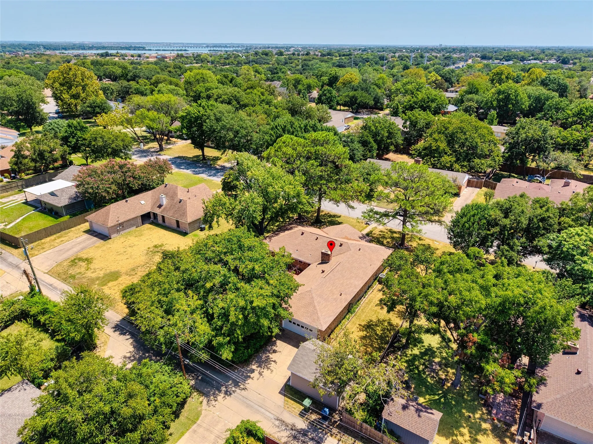 Expansive lot with mature trees and established landscaping