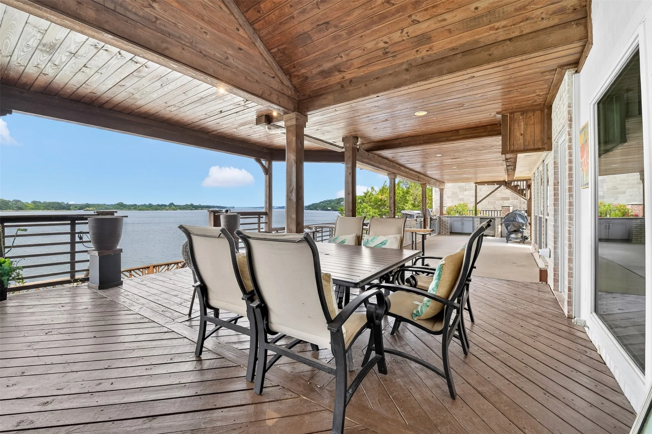 Outdoor dining area on expansive 3 story dock