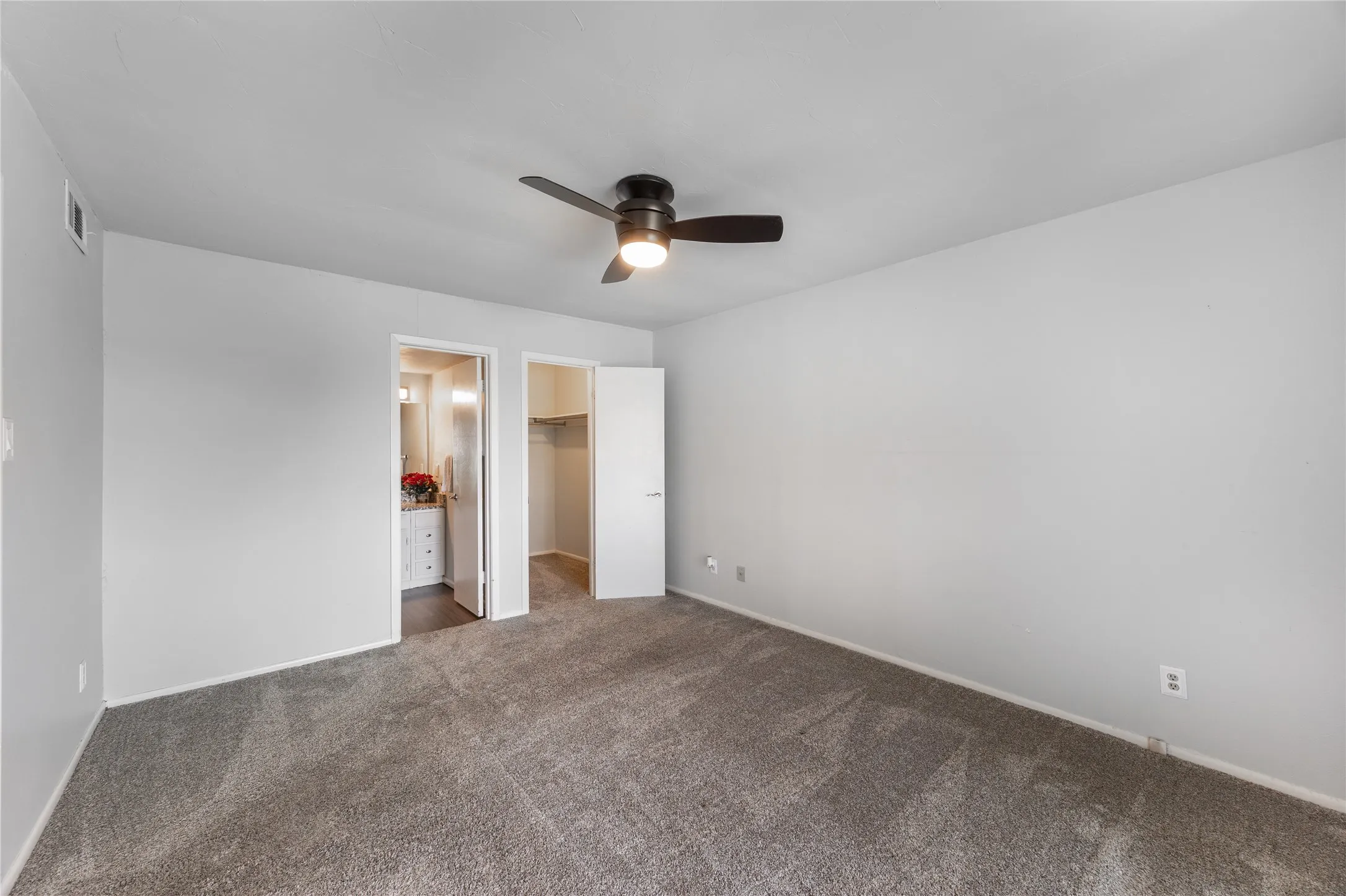Primary with view of bath and closet