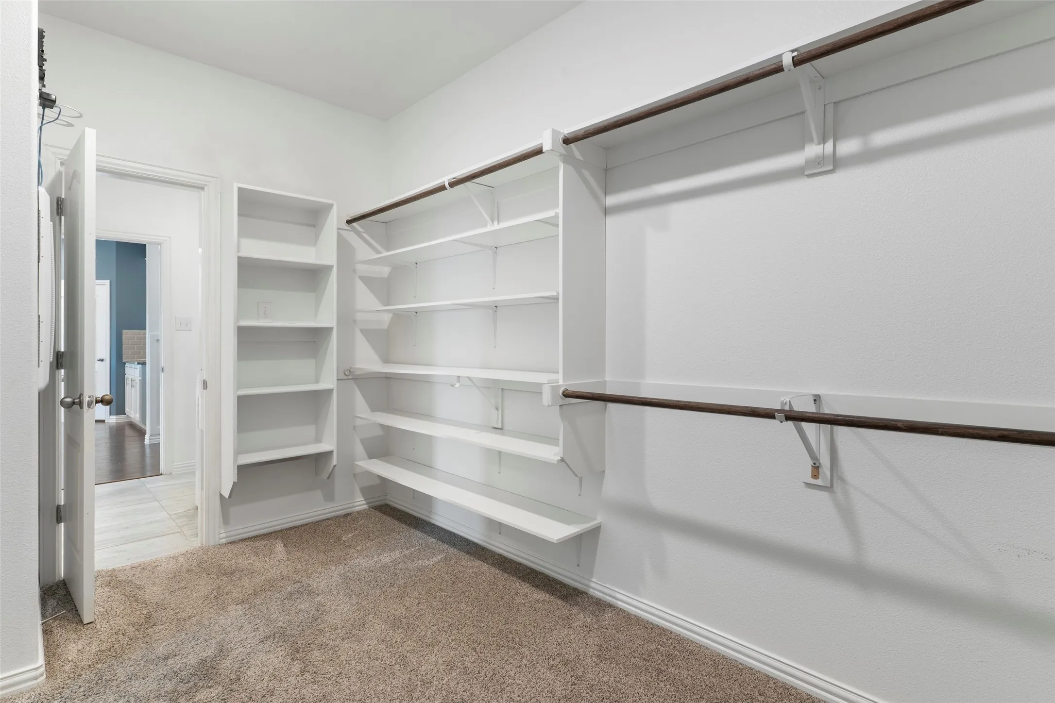 Laundry room access from walk-in closet!