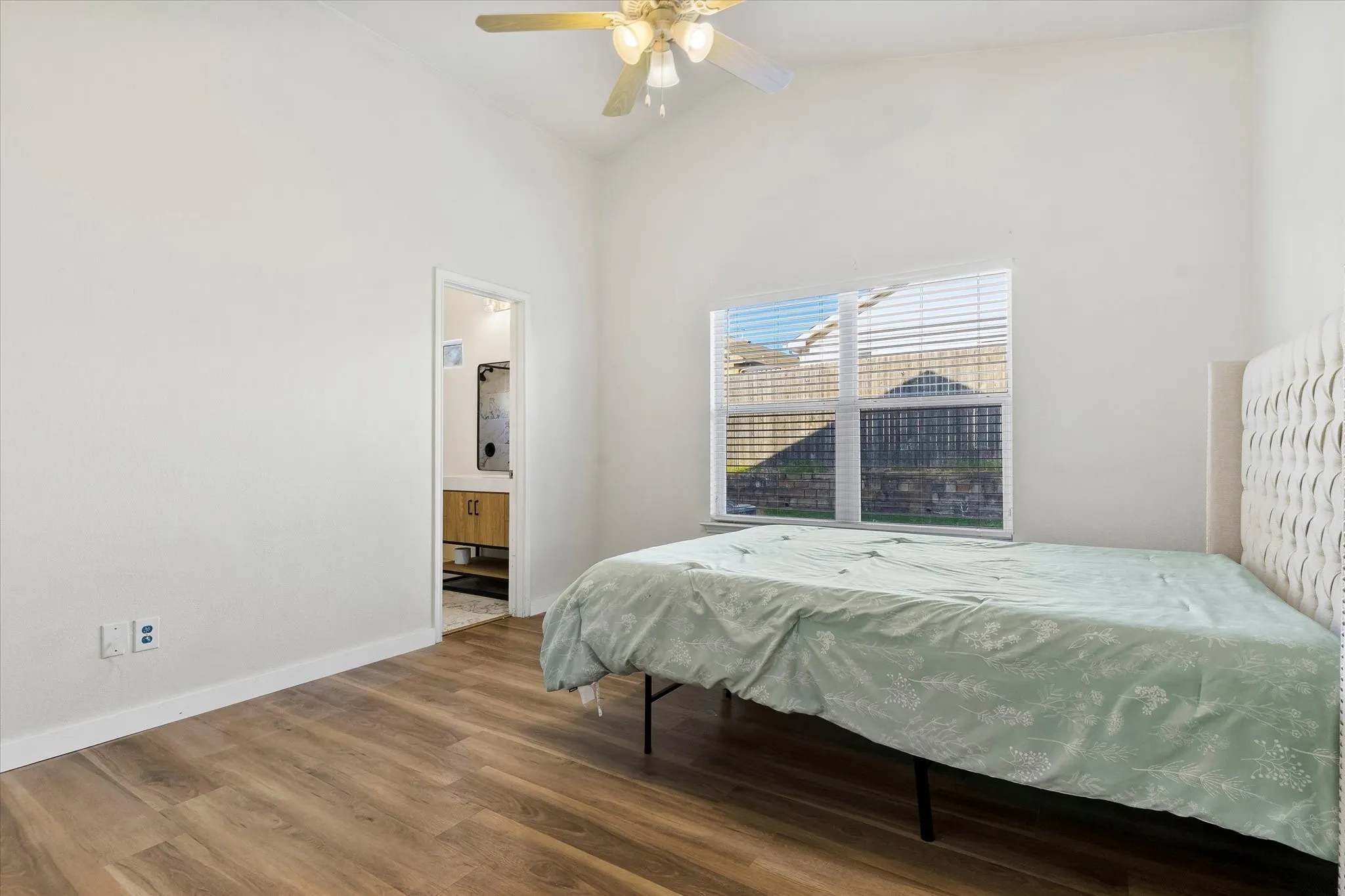Vaulted ceiling and fan