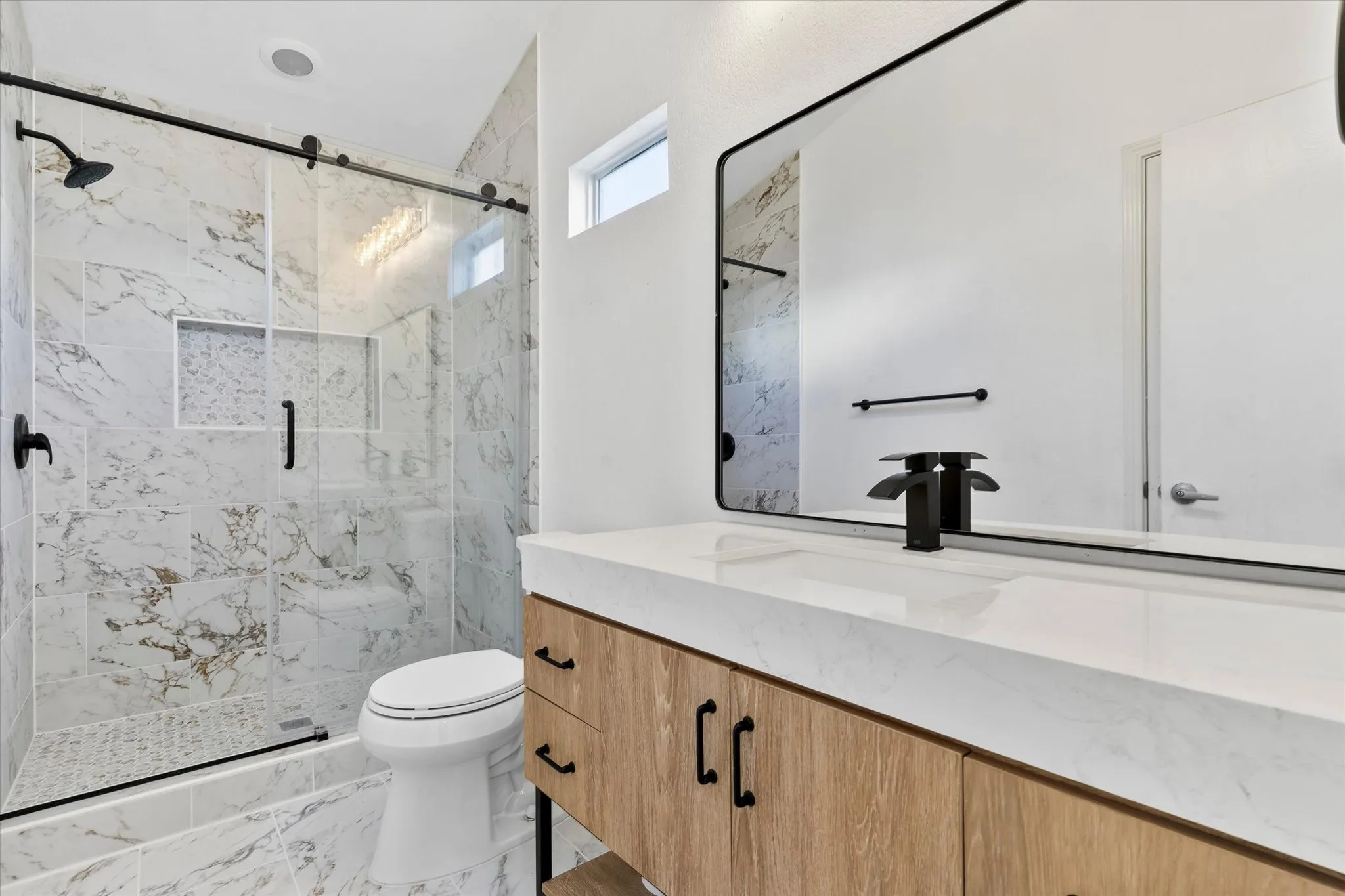 Remodeled with new vanity and shower.