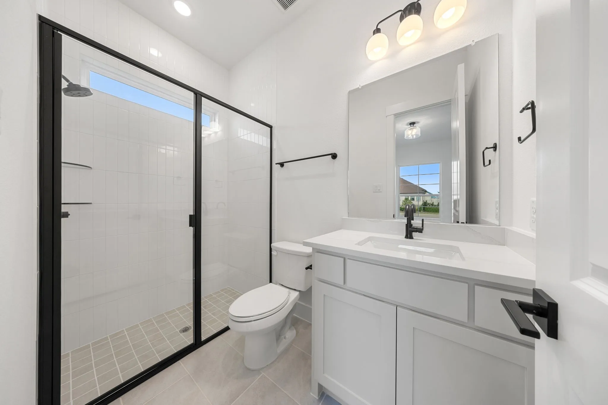 Friends and family will feel right at home in any of the beautifully finished guest baths this dream home has to offer.