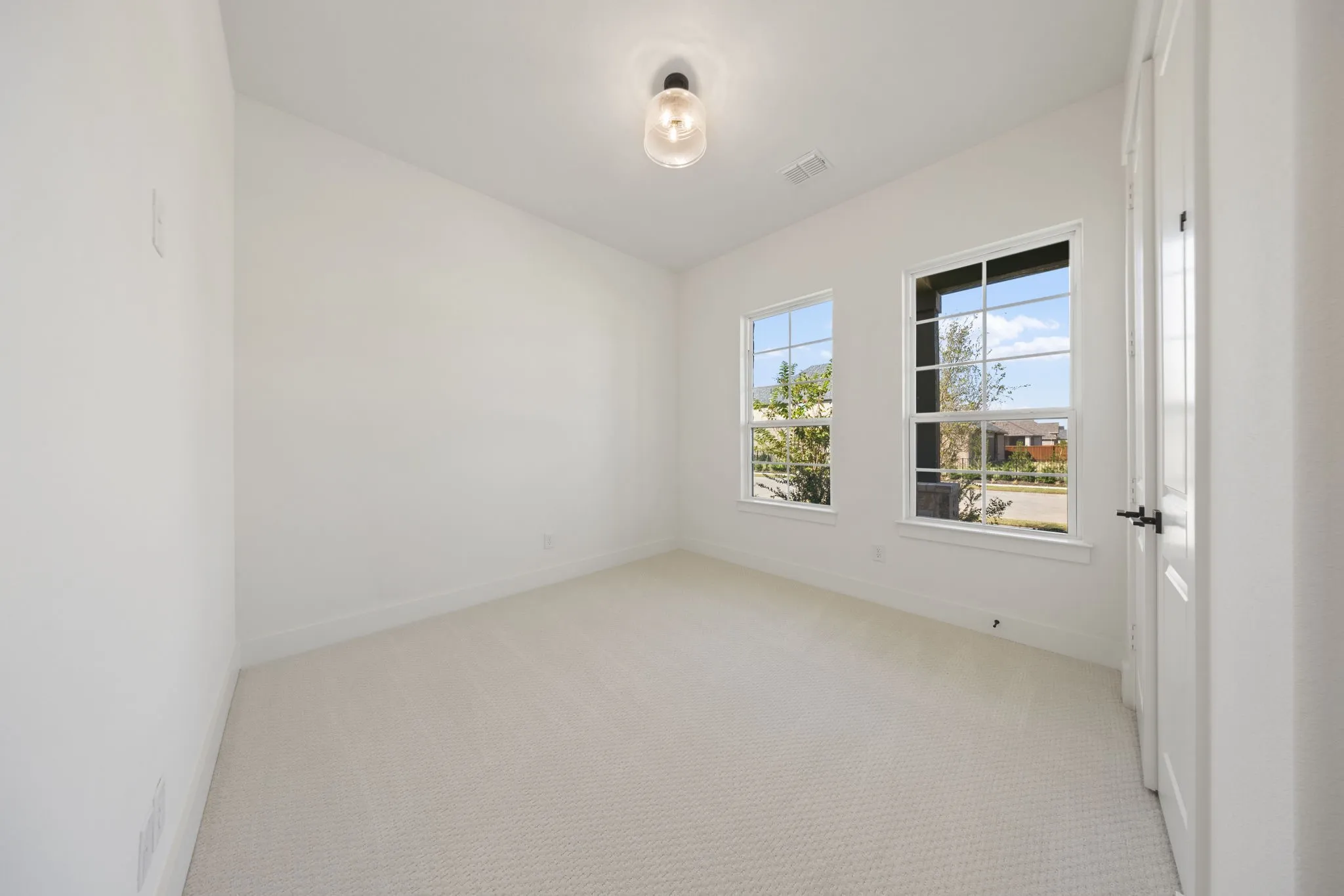 You'll find nicely sized secondary bedrooms in our Cathy floor plan.