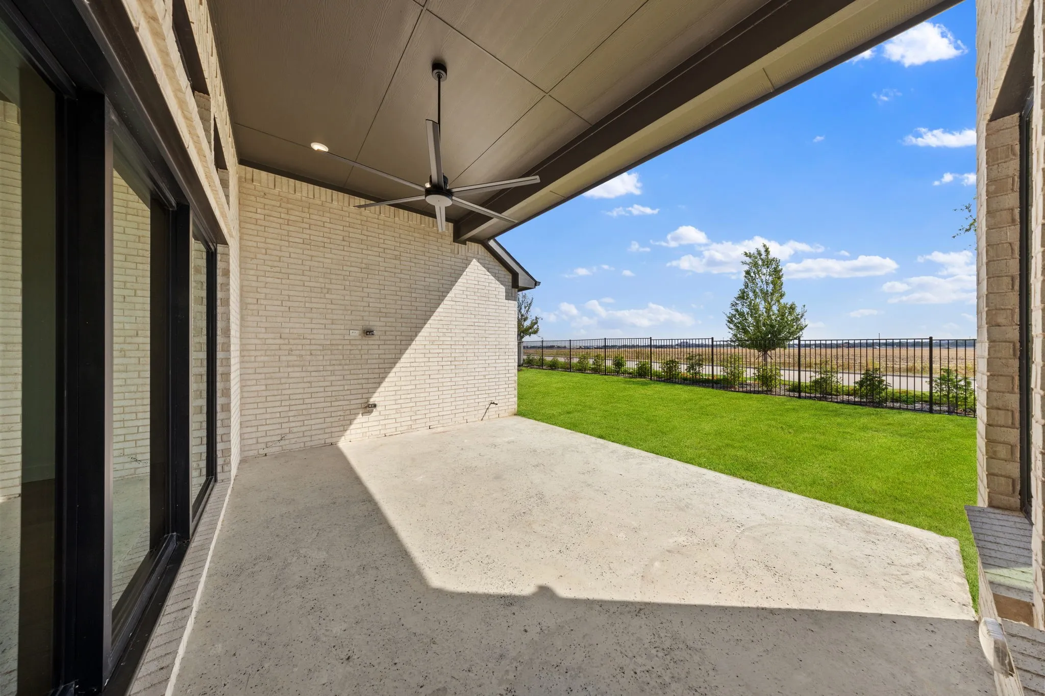 With a full wall slider leading from the family room to the covered patio, it's easy to take the party outside in this over the top home!