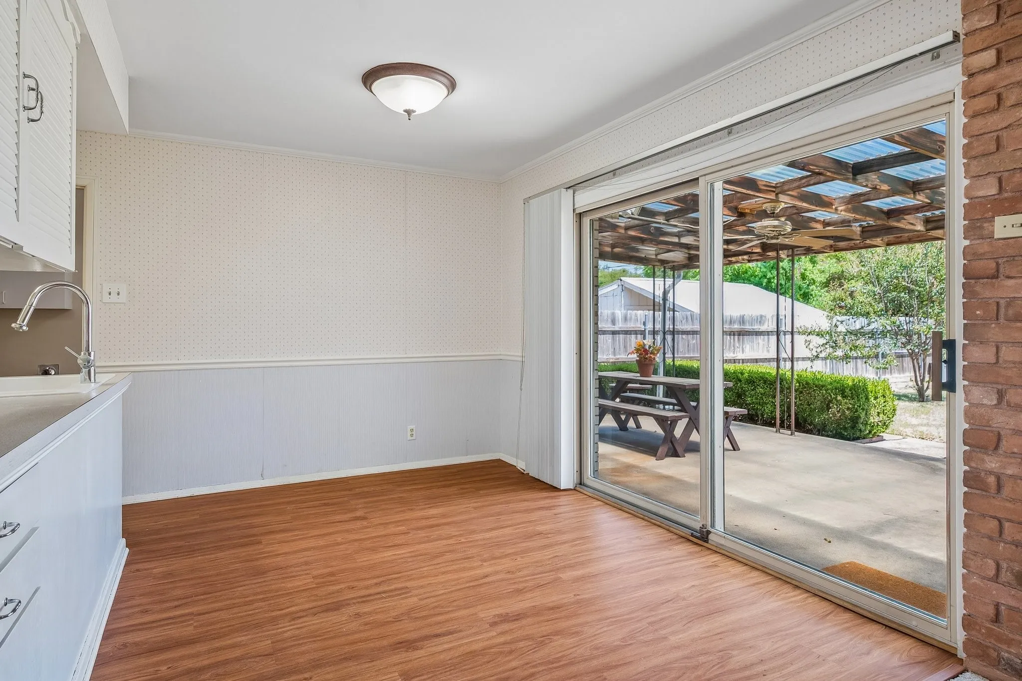 Dining area provides excellent views of the backyard.