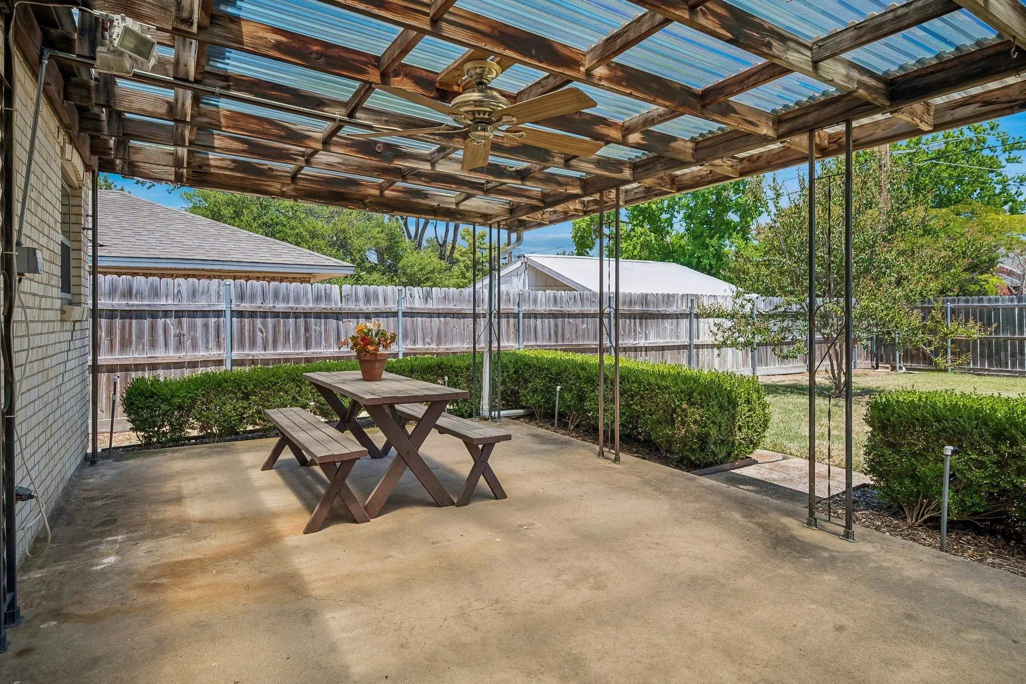 Beat the heat with a roomy covered patio that makes the perfect set up for weekend gatherings.