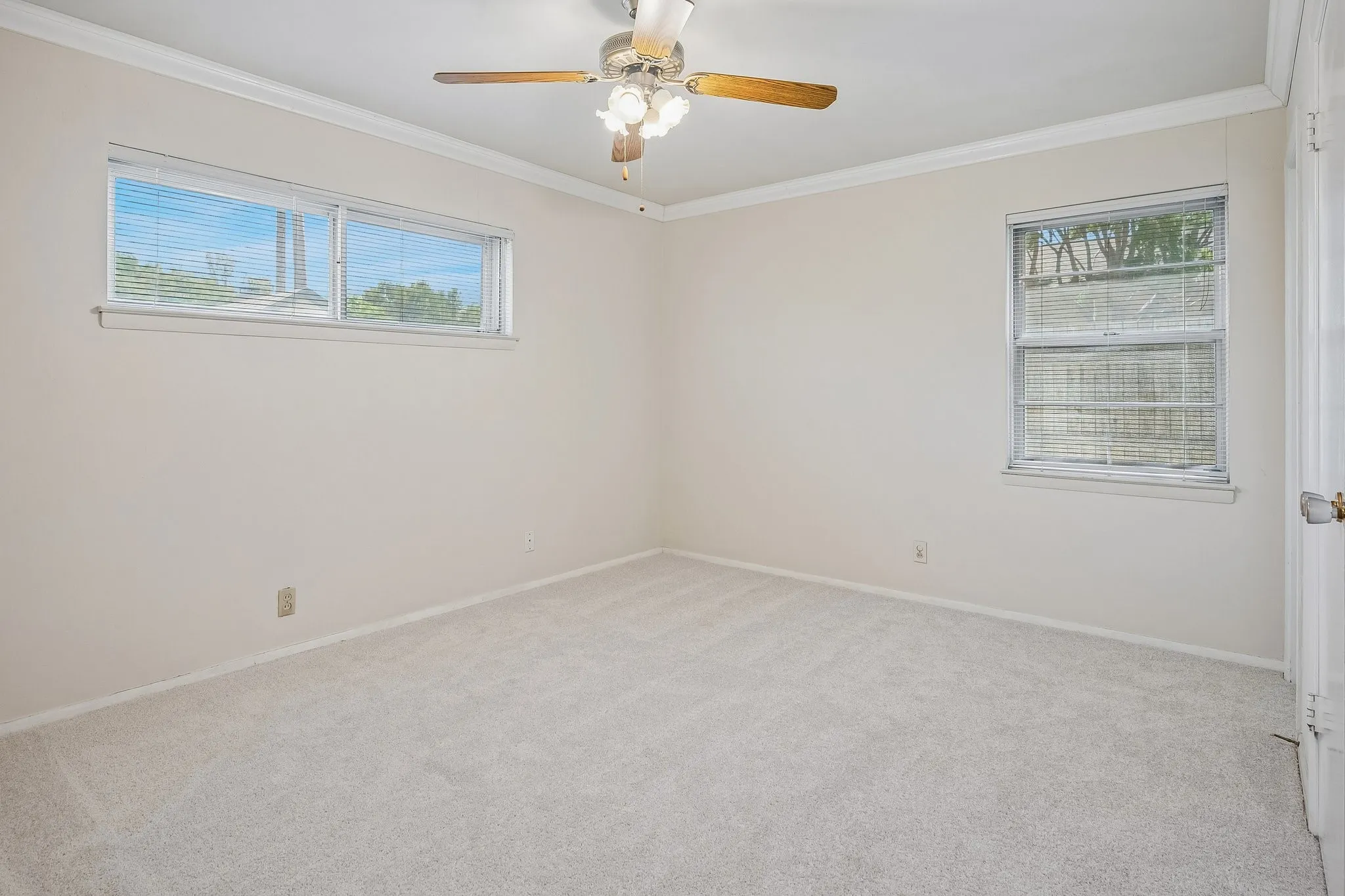 Retreat to the primary bedroom, equipped with an ensuite bathroom.