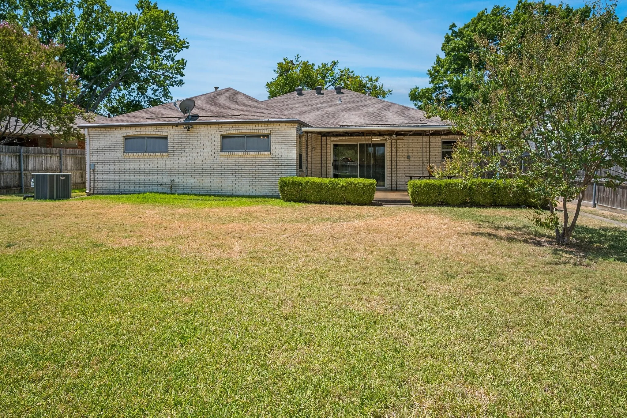 A fully functional sprinkler system for the front and back lawns make maintenance light work.