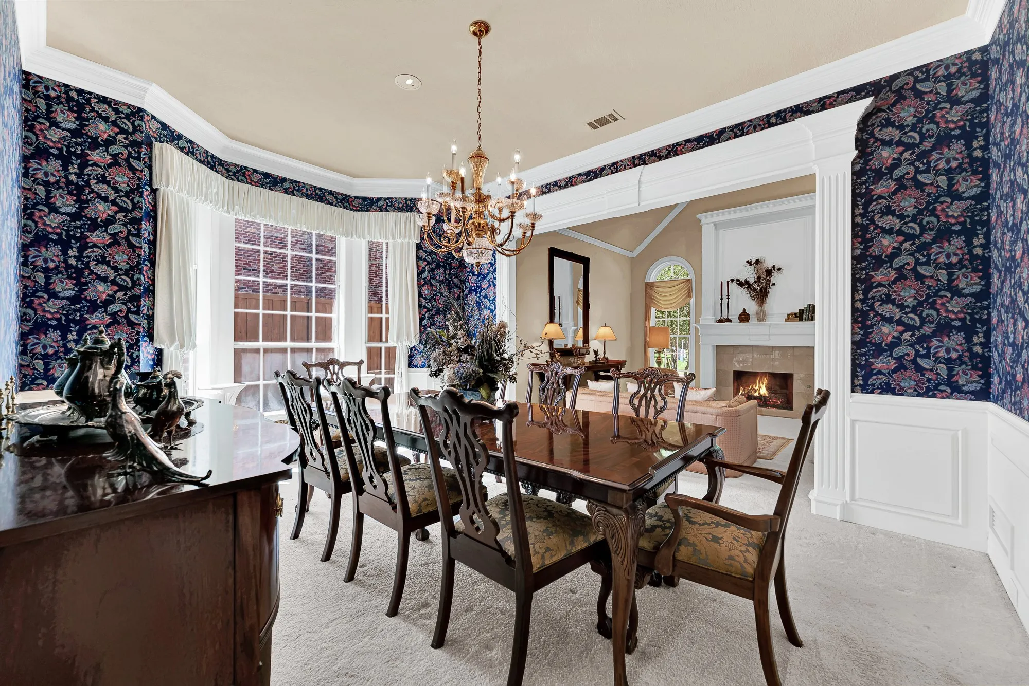A large, multi-window bay bathes the room in soft daytime light while framing views of the outdoors. Gather family together for memorable holiday feasts that turn into hours of laughter.