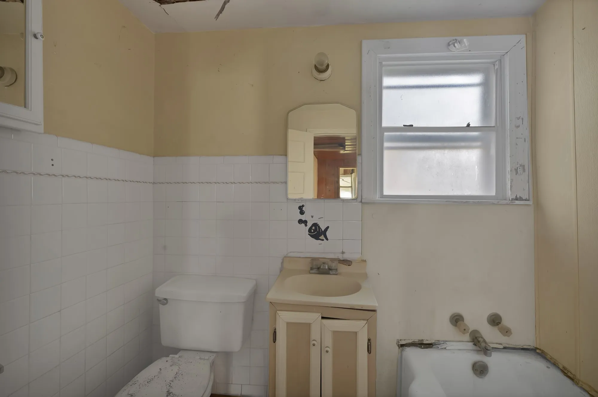 Bathroom with a garden tub and vanity