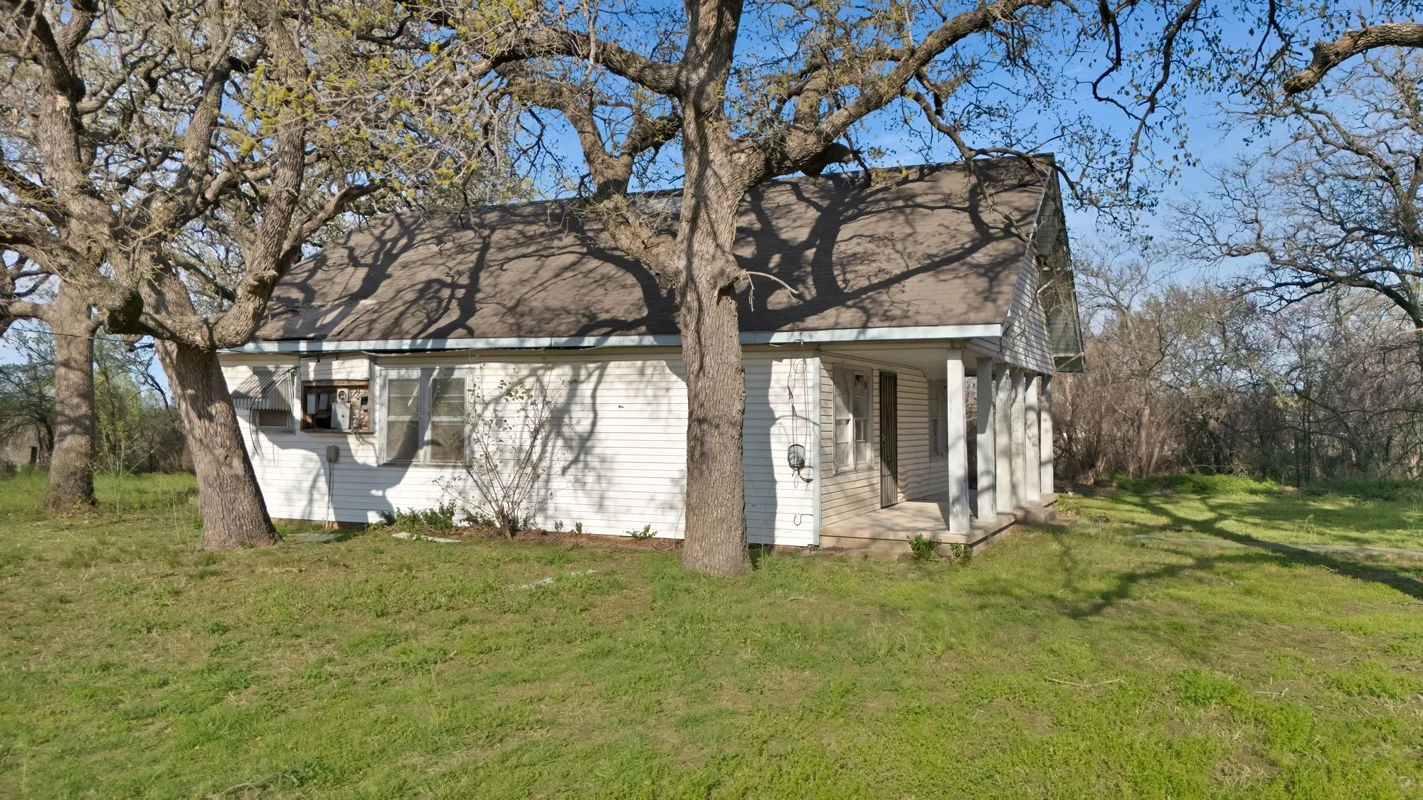 View of home's exterior with a lawn