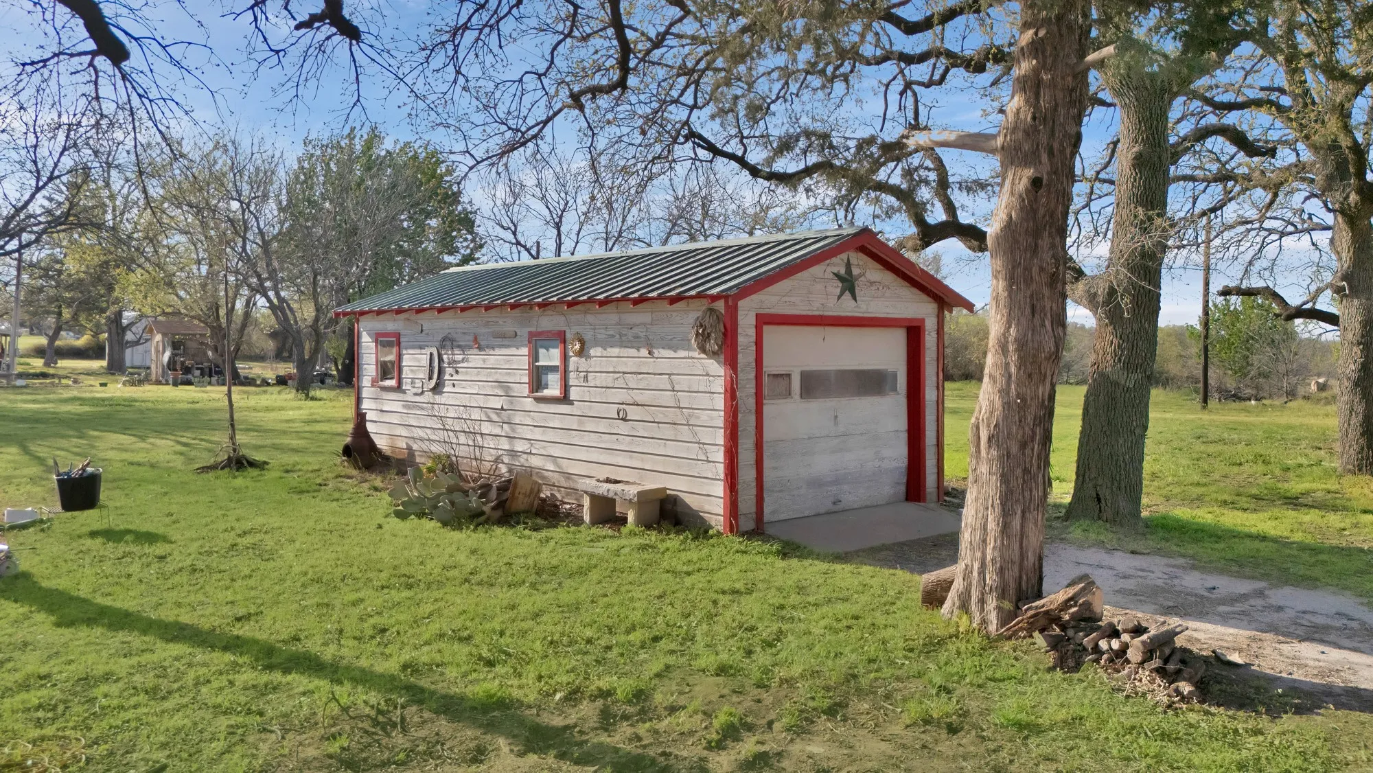 Detached garage featuring driveway